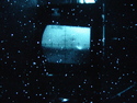 Synch light spot on bottom mirror target in V periscope